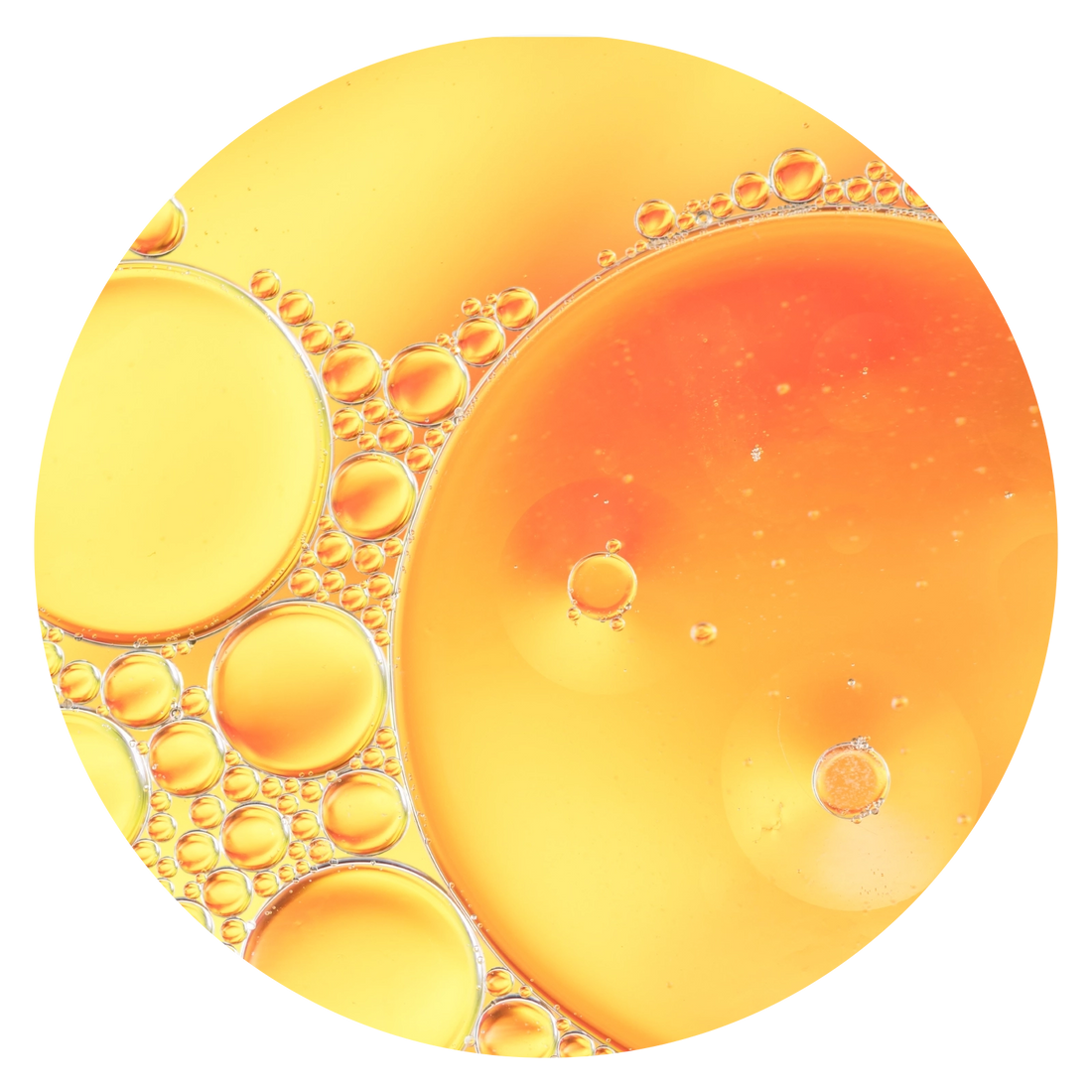 Vitamin C oil serum macro with bright golden bubbles